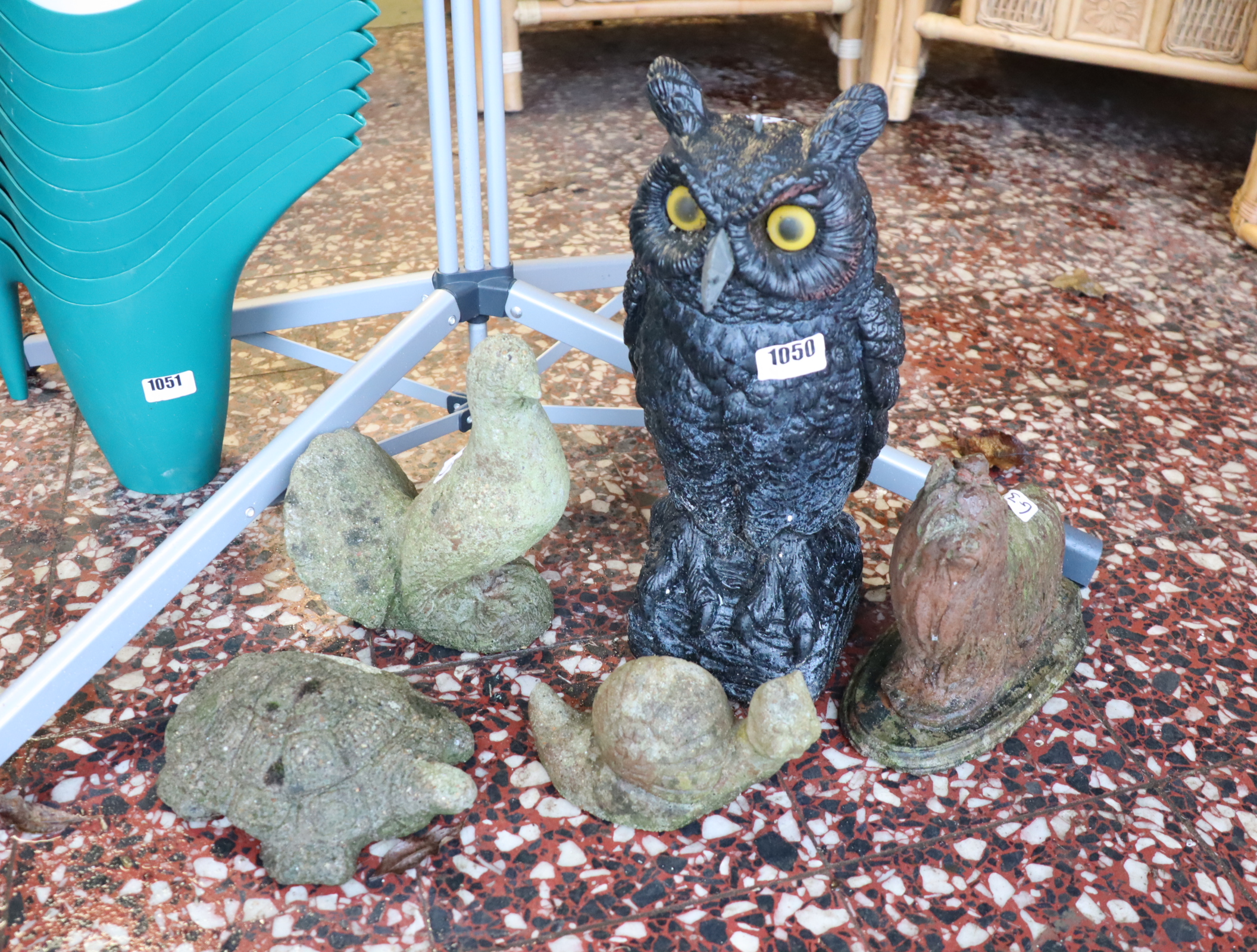 Black Plastic garden owl with 4 concrete garden figures in the form of various animals