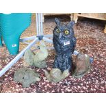Black Plastic garden owl with 4 concrete garden figures in the form of various animals