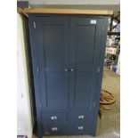 (10) Dark blue pantry cupboard with light oak fitted interior and oak top