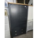 (12) Dark blue pantry cupboard with light oak fitted interior and oak top