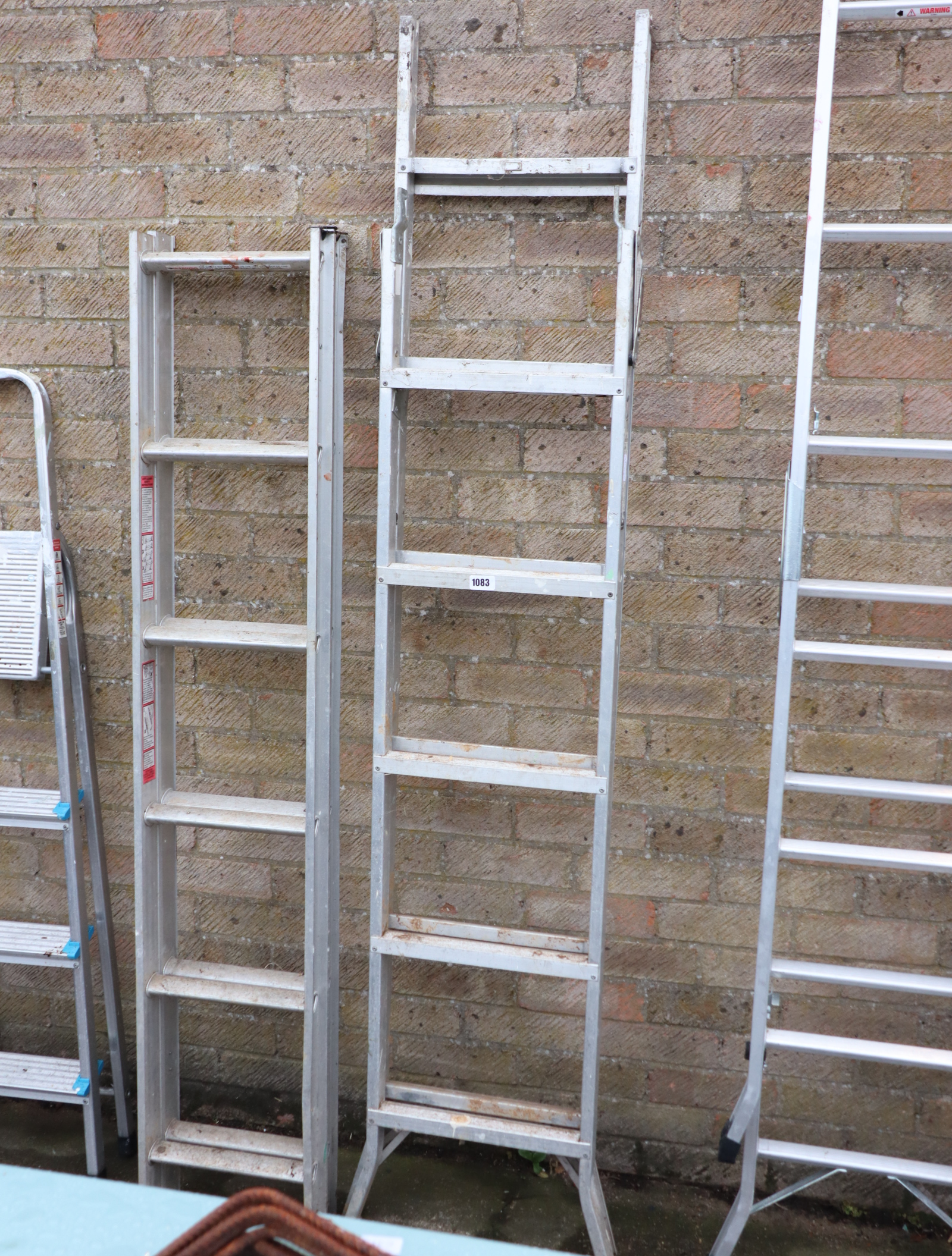 Pair of aluminium double extending ladders