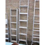 Pair of aluminium double extending ladders