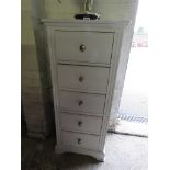 Light grey 5 drawer tall boy (damage to near right corner)