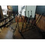 Wrought iron easel and Wellington boots rack