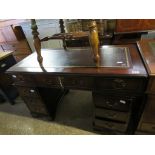 Mahogany twin pedestal desk with red leather surface