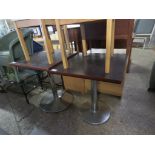 (2009) 2 wooden top bar tables on single pedestal circular metal bases