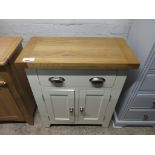 (2013) Small off-white coloured cupboard with single drawer and oak top