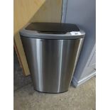 Silver coloured waste bin