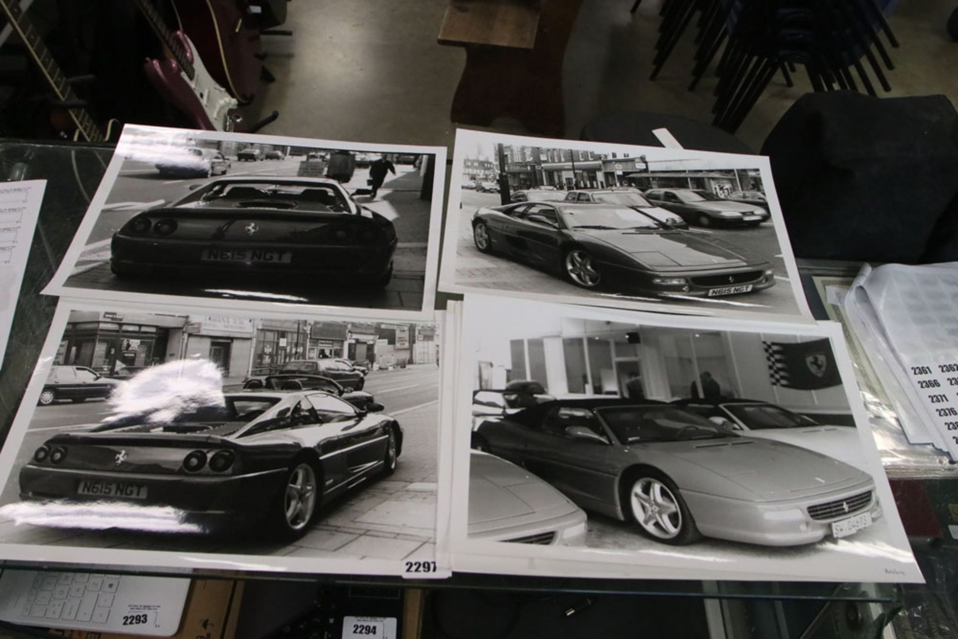 7 various black and white prints of various sports cars inc. Ferrari