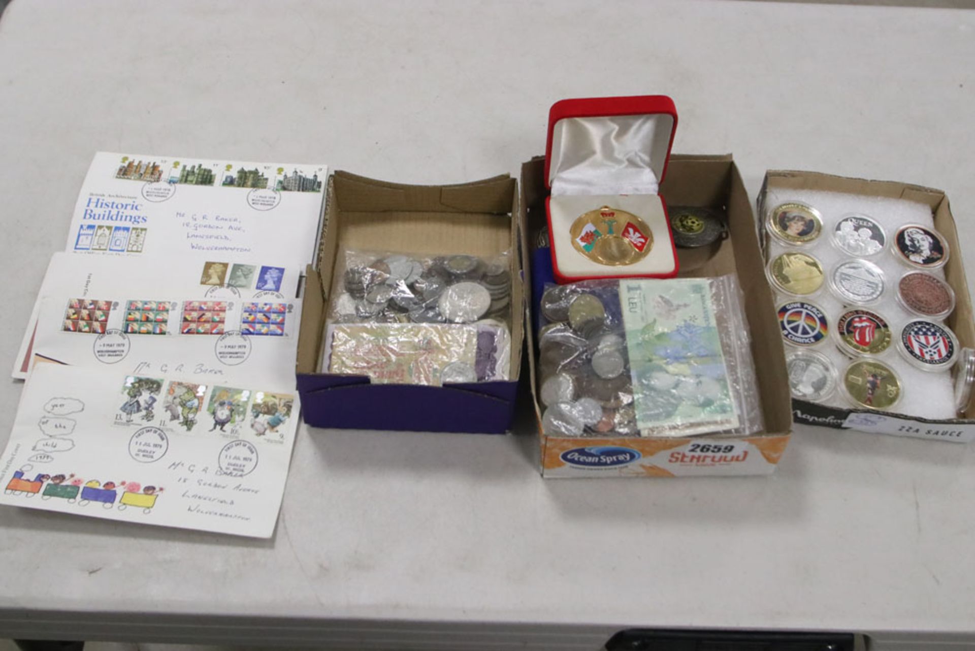 Tray of selection of various stamps, coins and banknotes