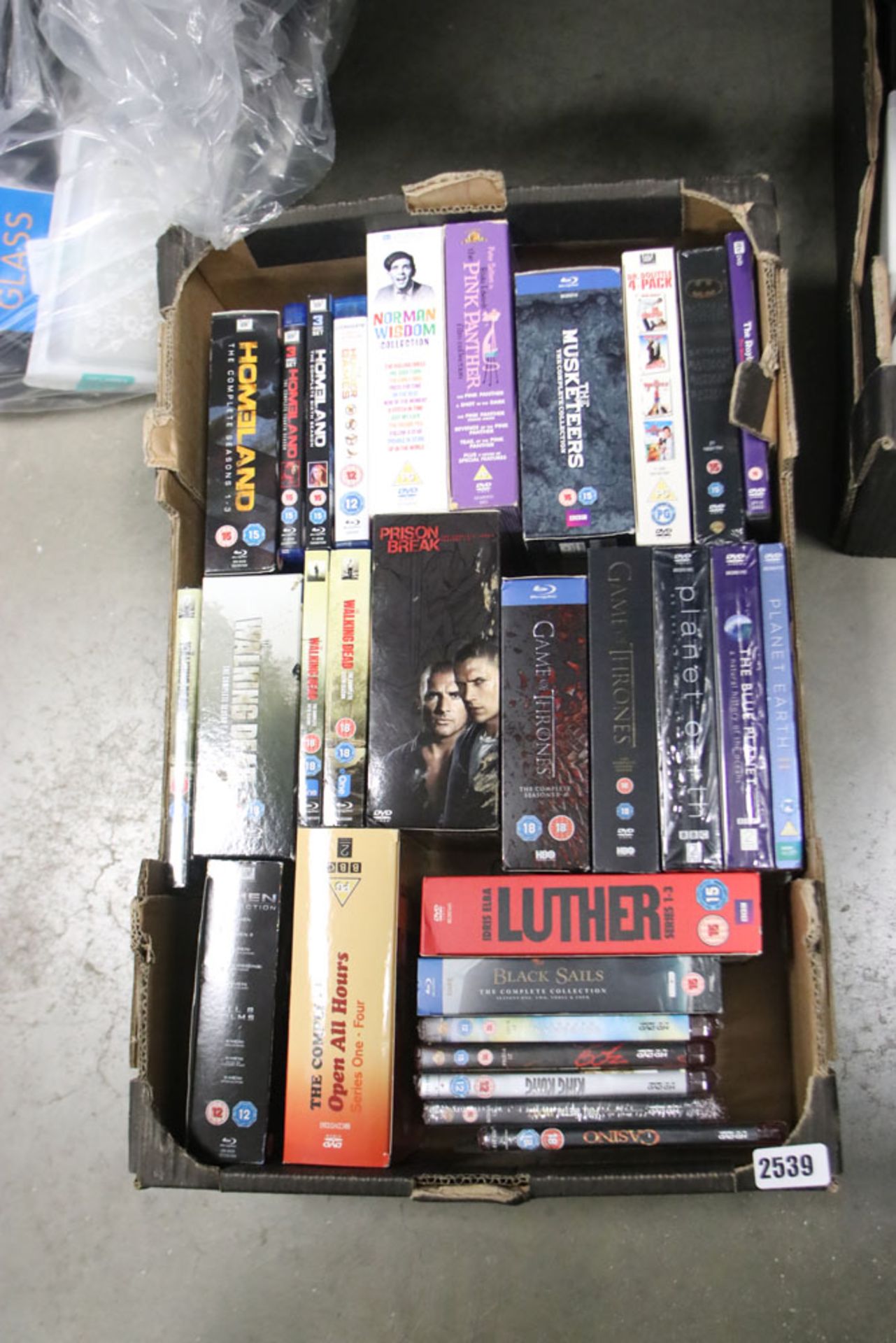 Tray containing various box sets inc. Luther, Prison Break and others