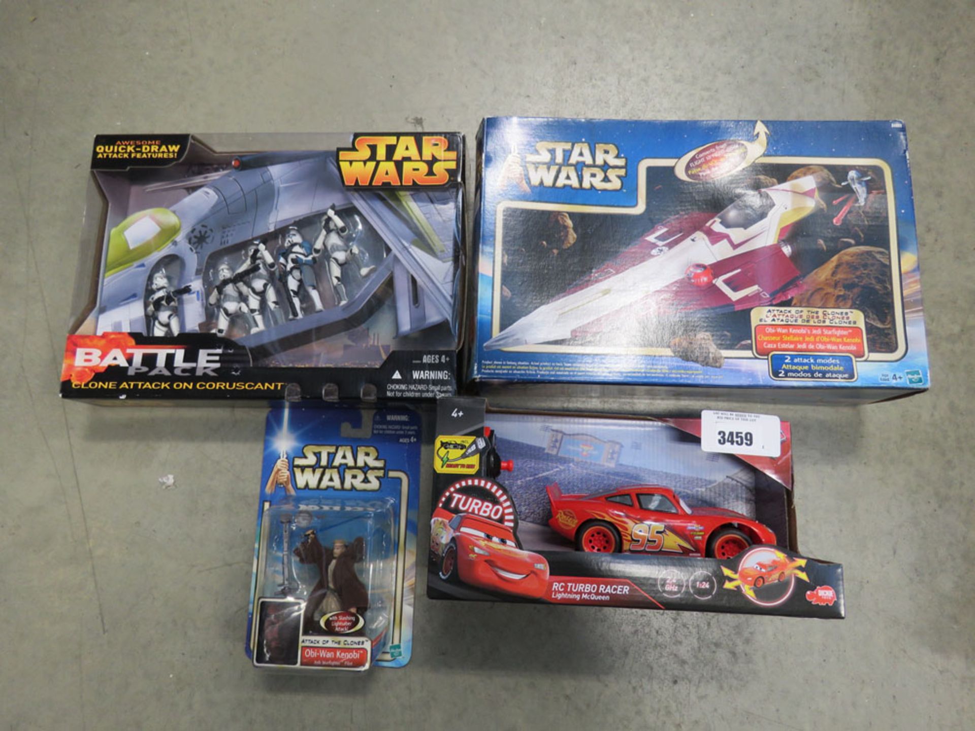 Remote control racing car plus 3 boxed starwars toys