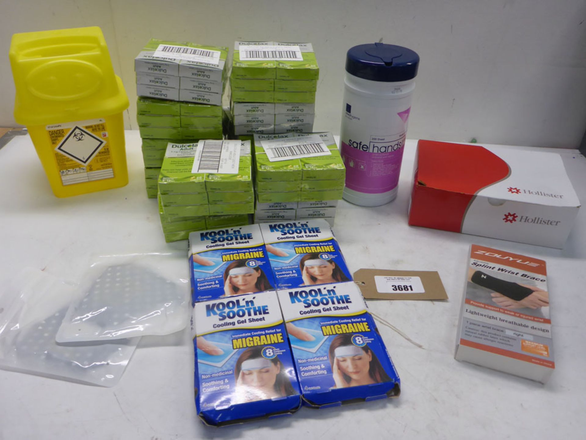 72 packs of Dulcolax Adult tablets Exp 10/2023, Splint wrist brace, Migraine cooling gel sheets