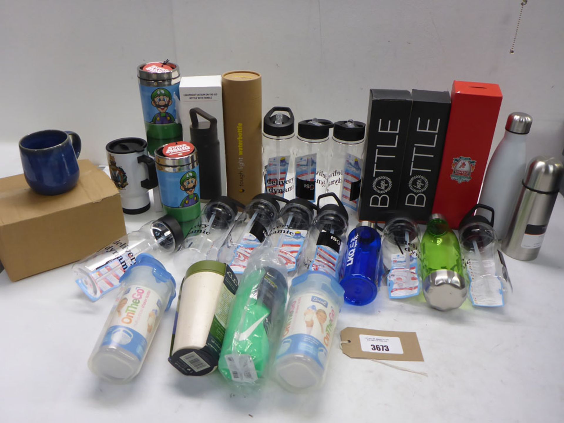 Selection of coffee mugs, water bottles, small thermos and travel mugs