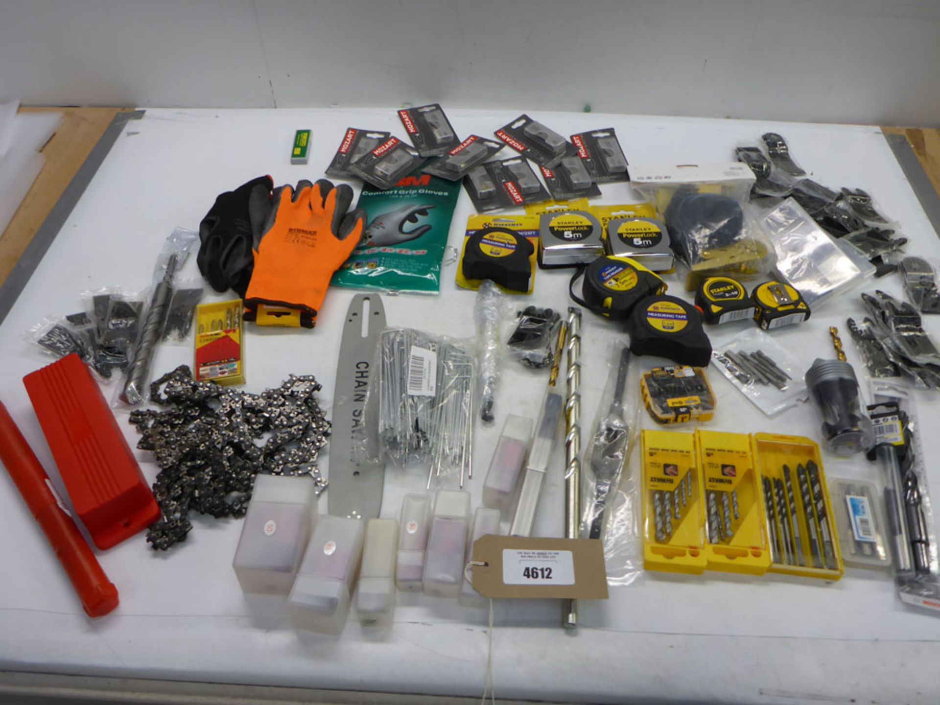 Tape measures, drill & router bits, multi tool blades, chain saw arm & chains, work gloves etc