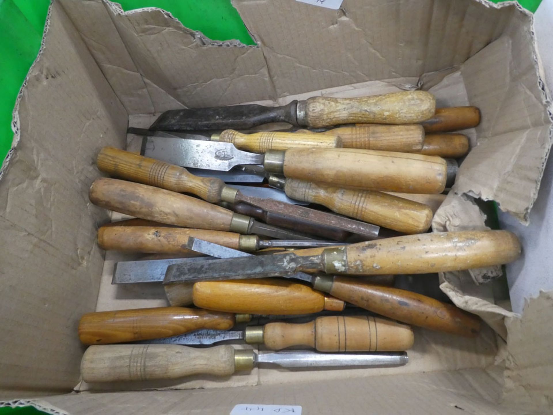 Box of various wood carving tools and wood chisels