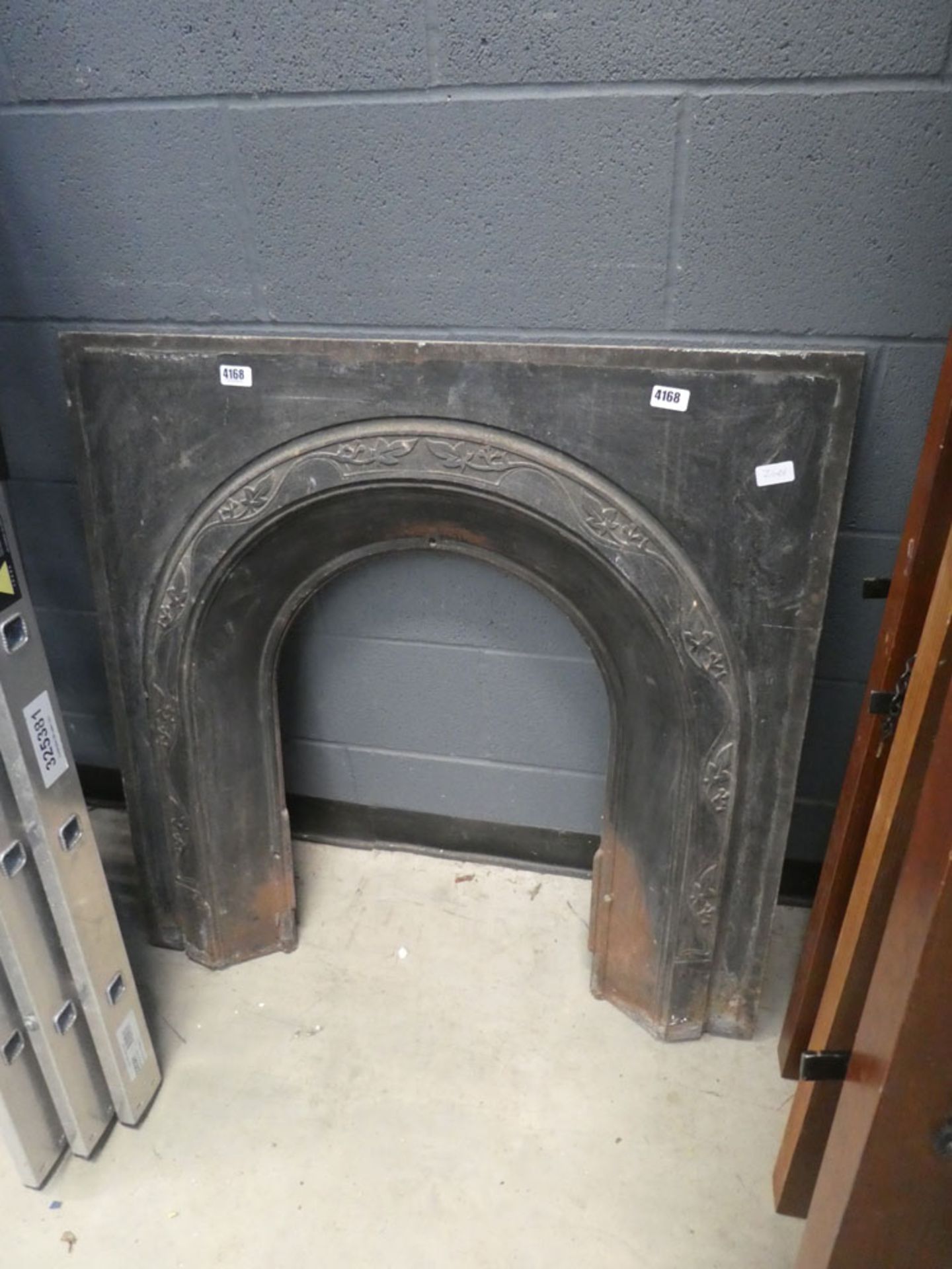 Cast iron fire back