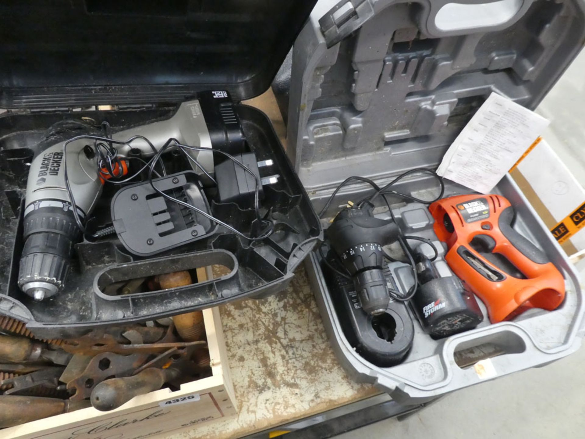 Black and Decker drill with 1 battery and charger, and Black & Decker drill with battery and charger