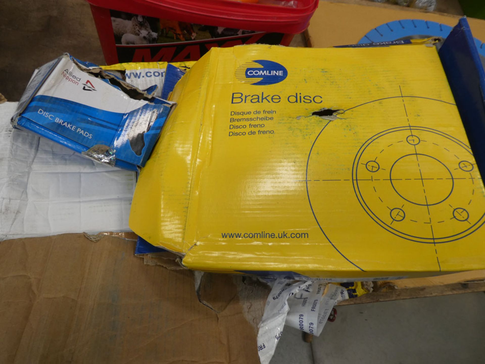 Box containing various brake parts