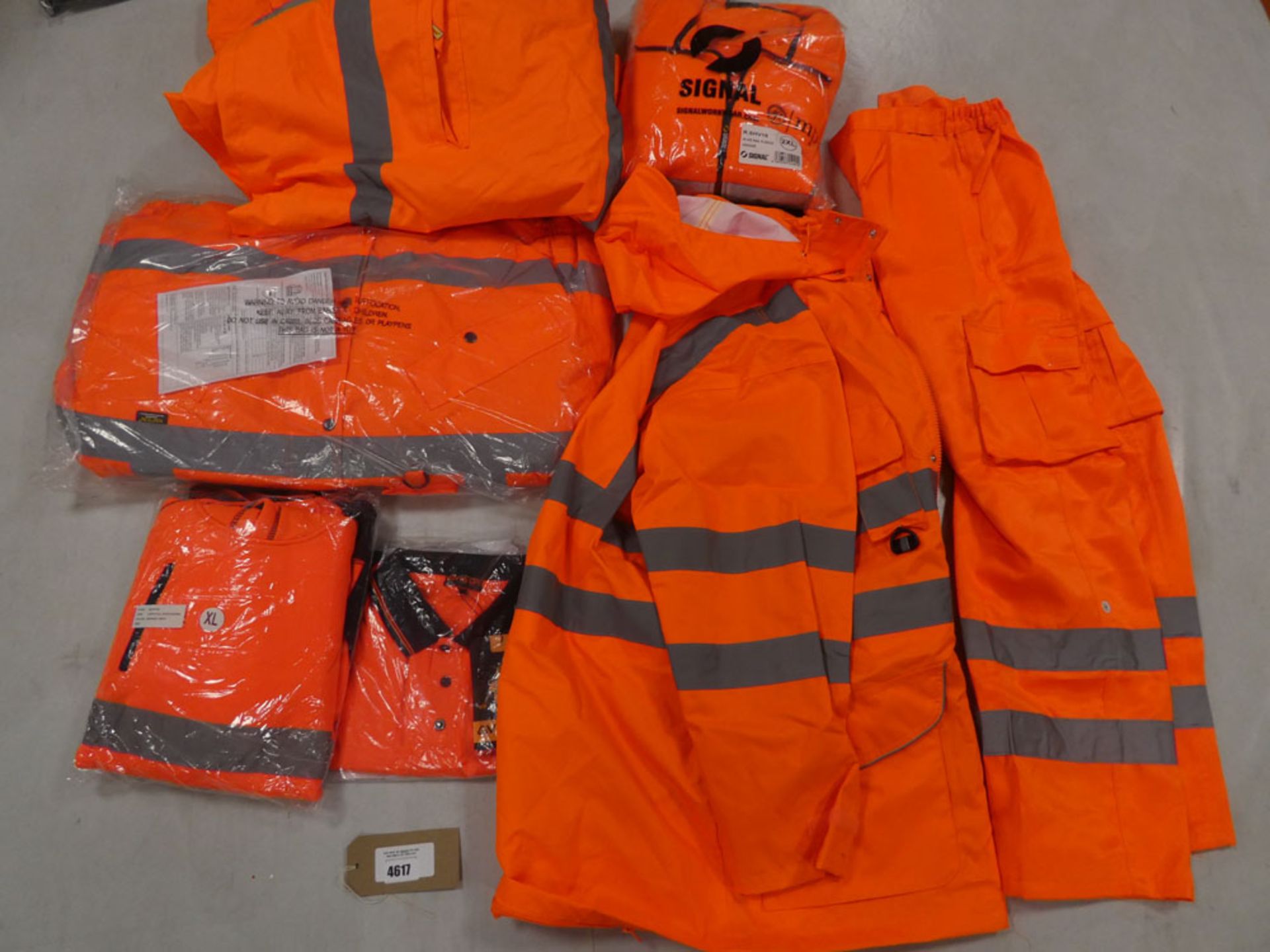 Bag containing selection of hi vis clothing