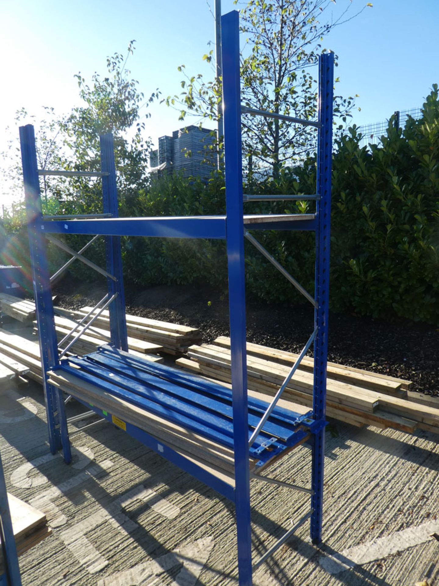 Blue Dexion style rack with one other flatpack