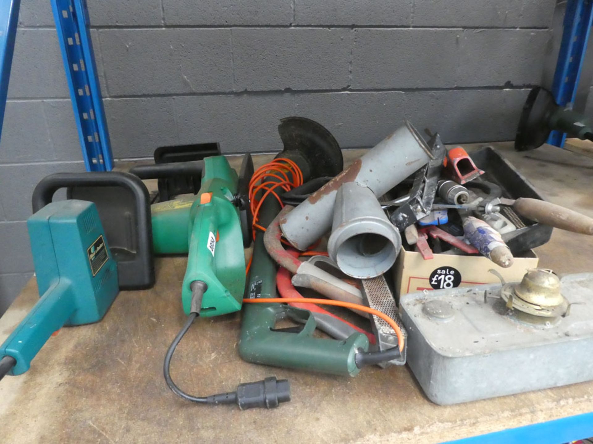 Black and Decker electric hedgecutter, chainsaw, strimmer, and various other handtools