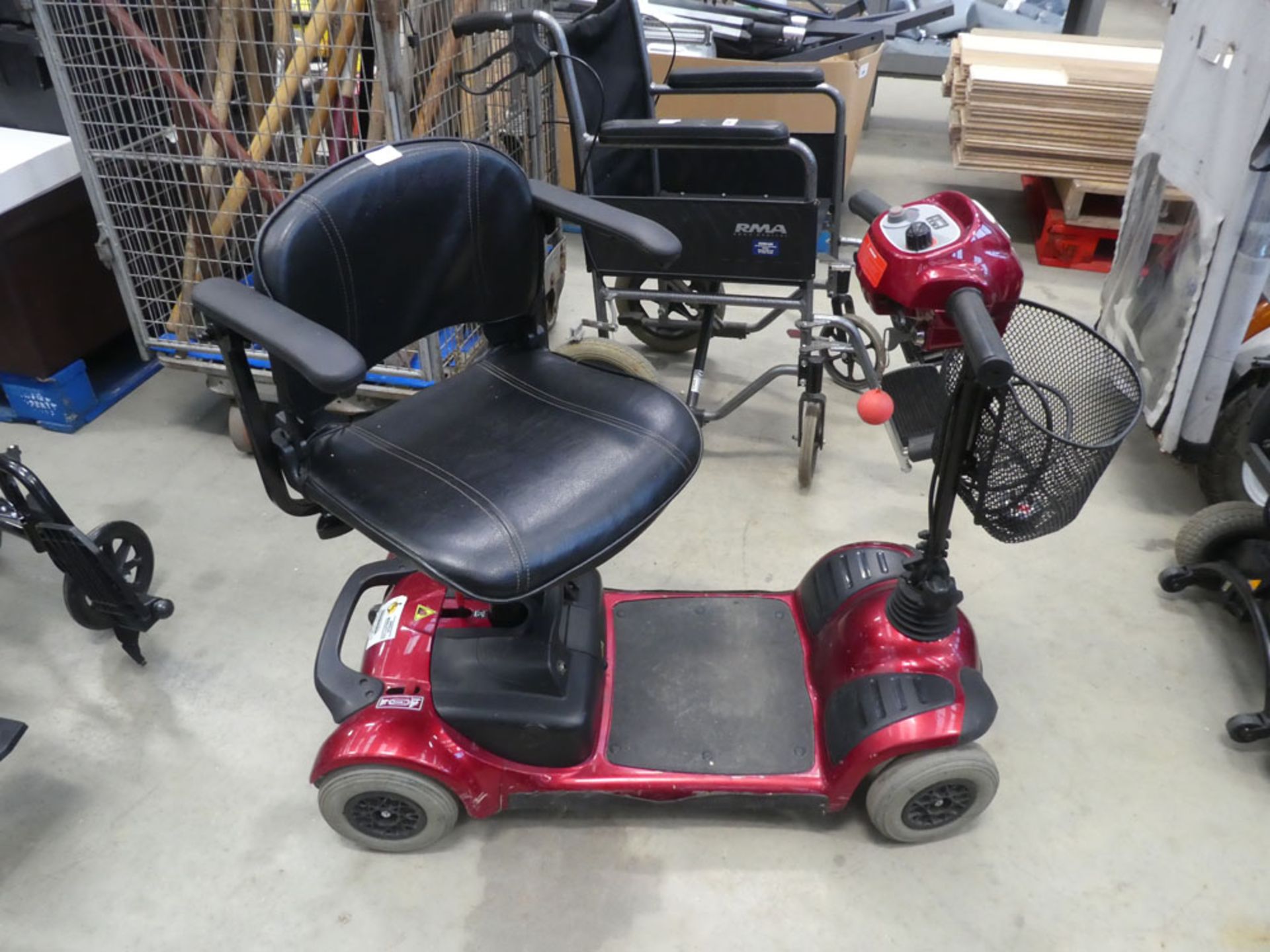 Red Shoprider mobility scooter