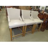 Three cream leather effect chairs