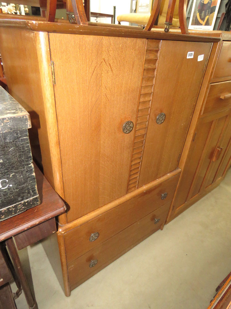 Oak finished double door cabinet with two drawers under