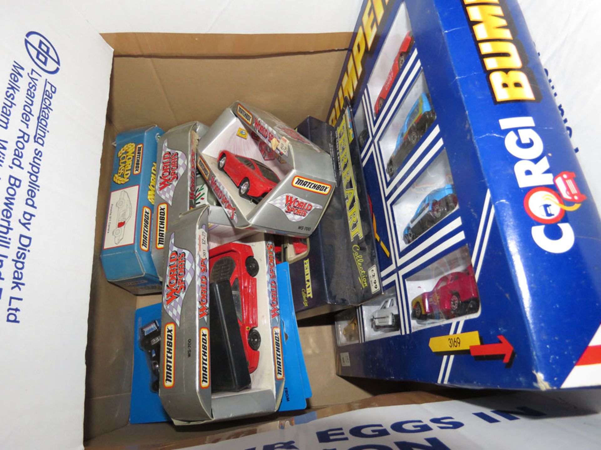 Box containing quantity of Matchbox and Corgi cars