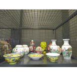 5558 Cage containing oriental ginger jars, vases and teabowls