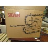 Sewing machine by Silver