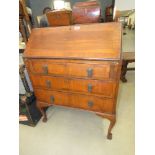 Walnut bureau with three drawers under