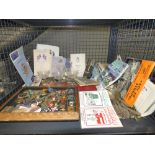 Cage containing a quantity of badges, loose cutlery, ephemera and glasses