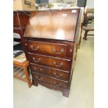 Reproduction mahogany bureau with four drawers under