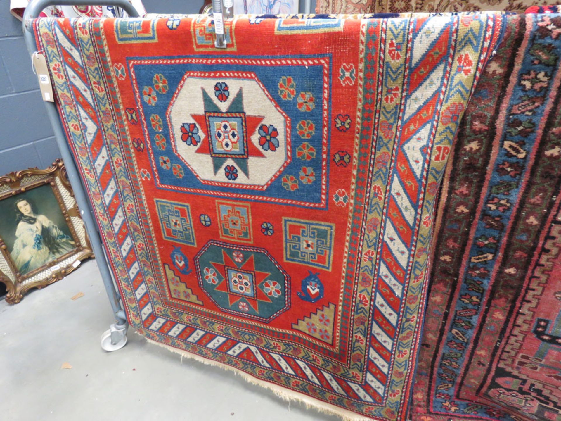 (4) Red and blue mat with central medallion