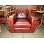 Brown leather armchair