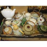 Box containing novelty and other teapots