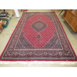 Red and brown Afghan carpet