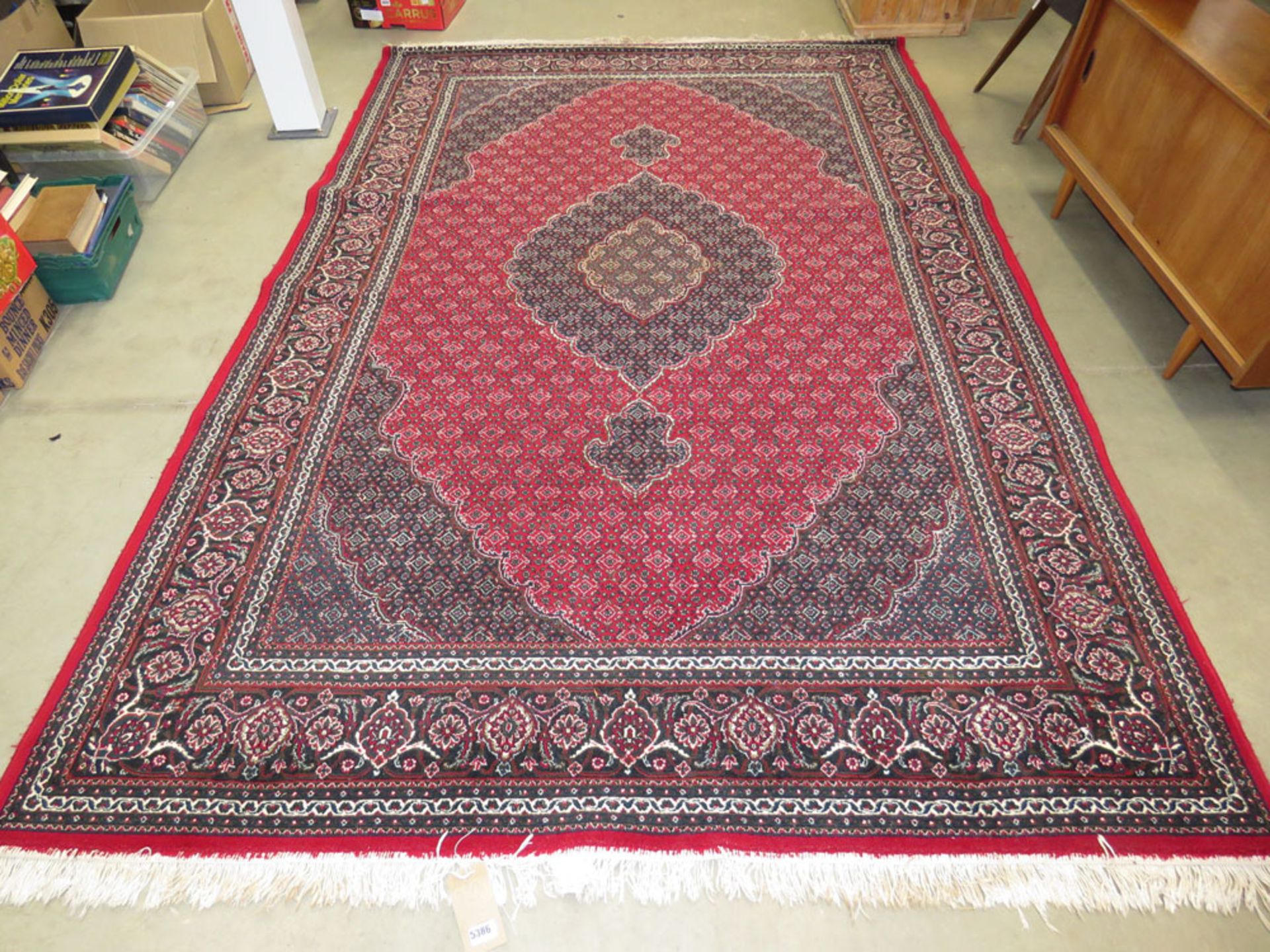 Red and brown Afghan carpet