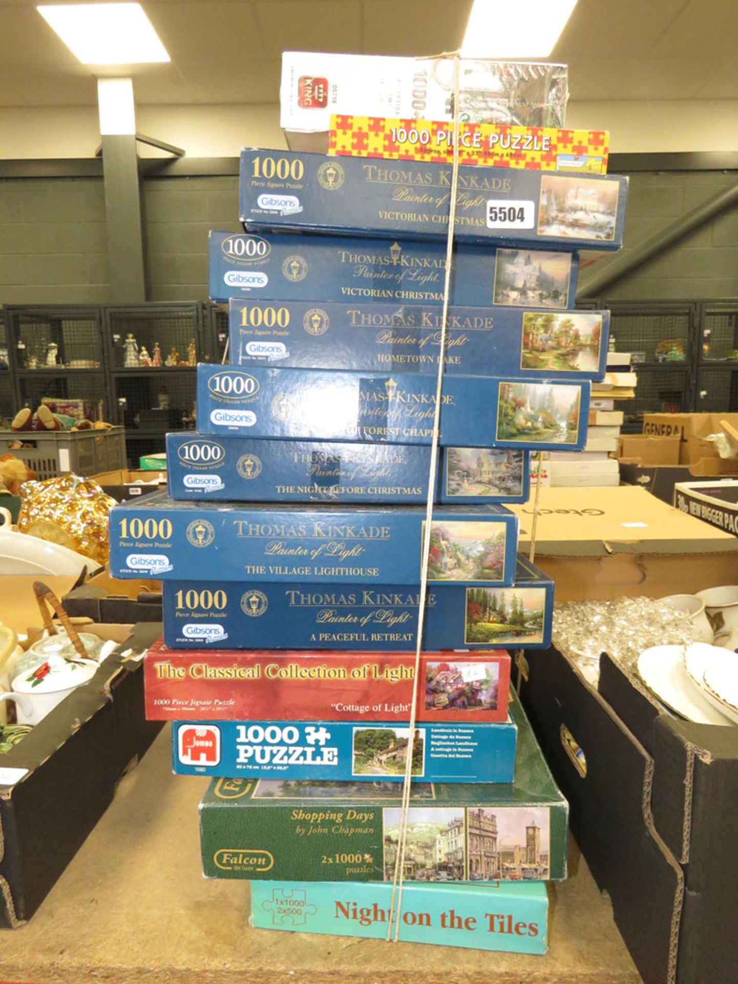Large stack of jigsaw puzzles