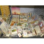 Cage containing quantity of of cigarette cards and matchboxes