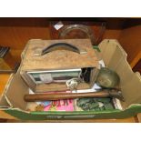 5230 Box containing anniversary medals, diecast military trucks, a battery charger, an axe and brass