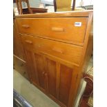 Oak double door cupboard with two drawers over