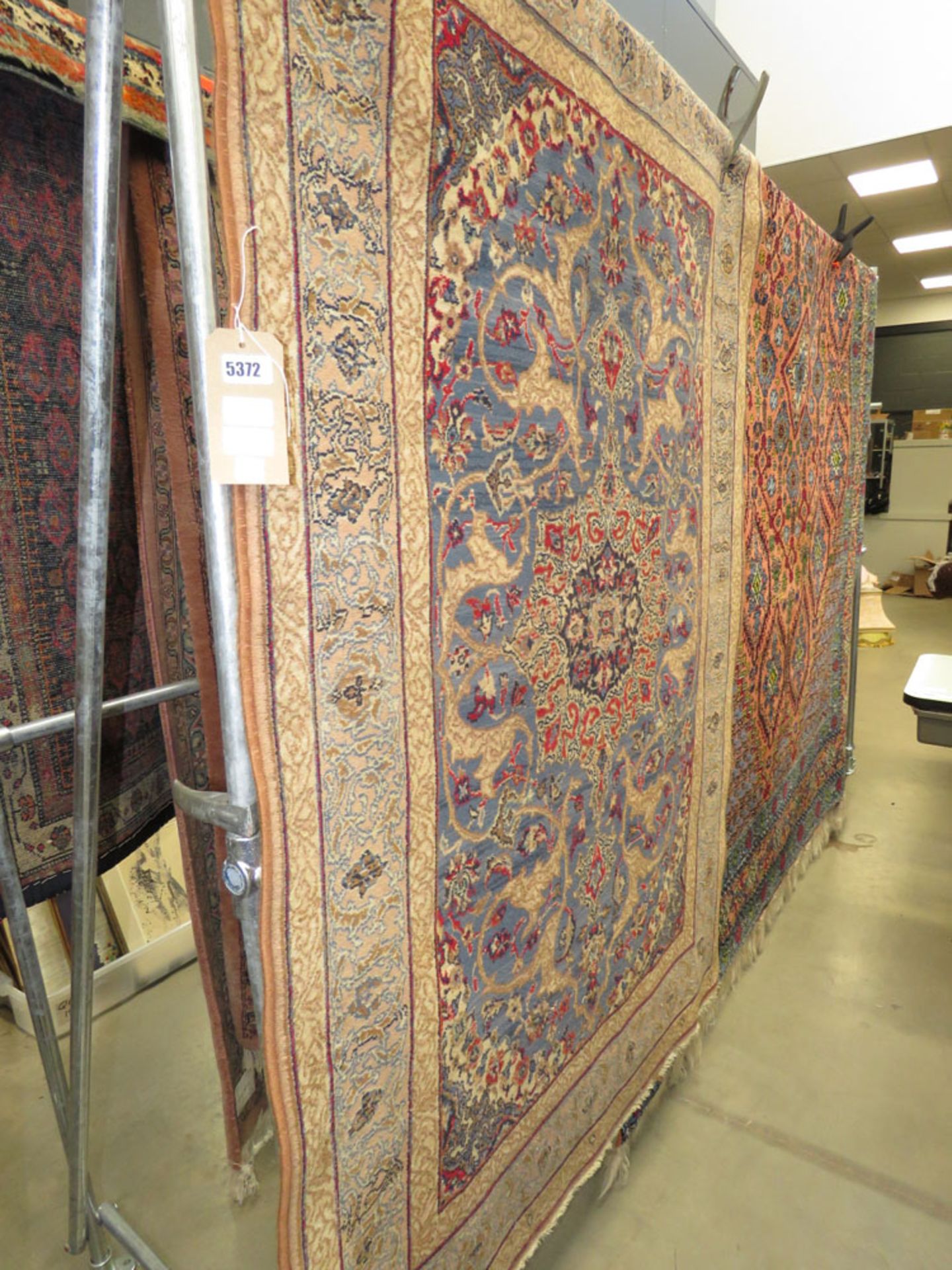 (9) Louis De Poortere brown and blue floral carpet
