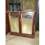 Mirrored empire style double door cupboard with marble surface