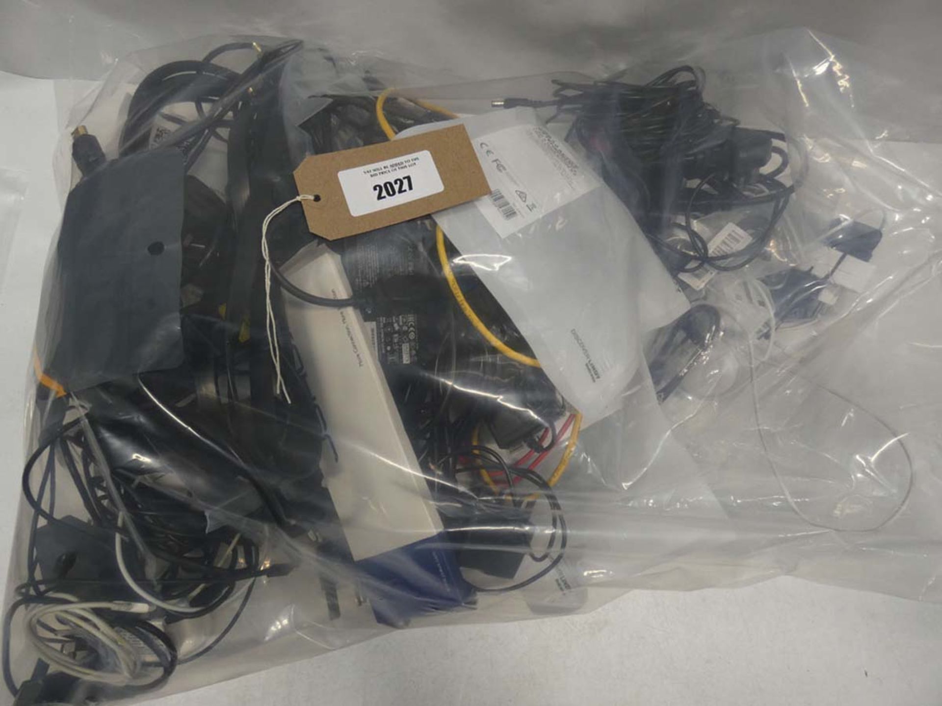 Bag containing quantity of cables, leads and PSUs