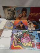 Box containing LP and 45 records to include David Bowie, Basement Jaxx, The Police, New Order and