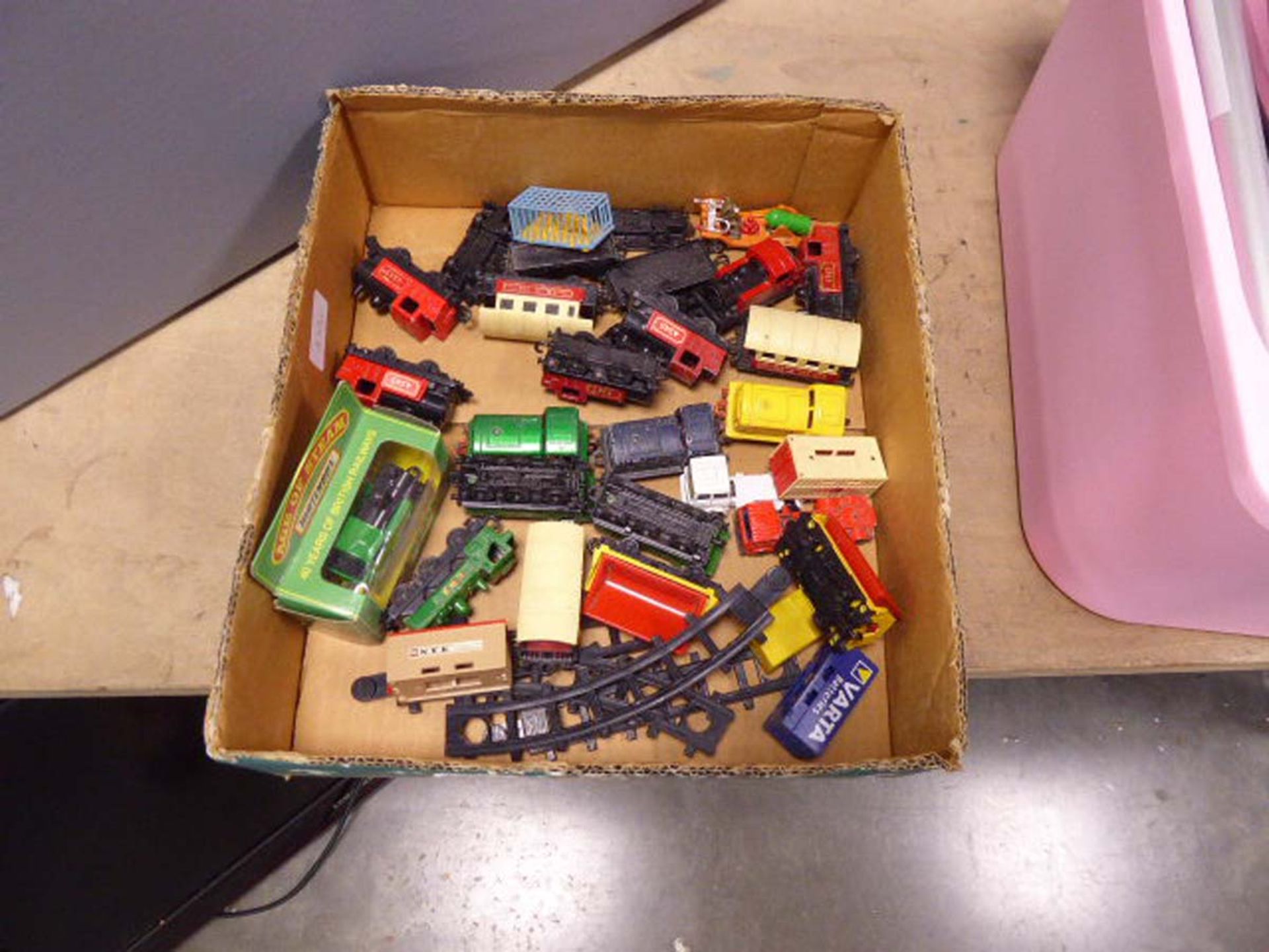 Box of Matchbox and other vehicles inc. trains etc.