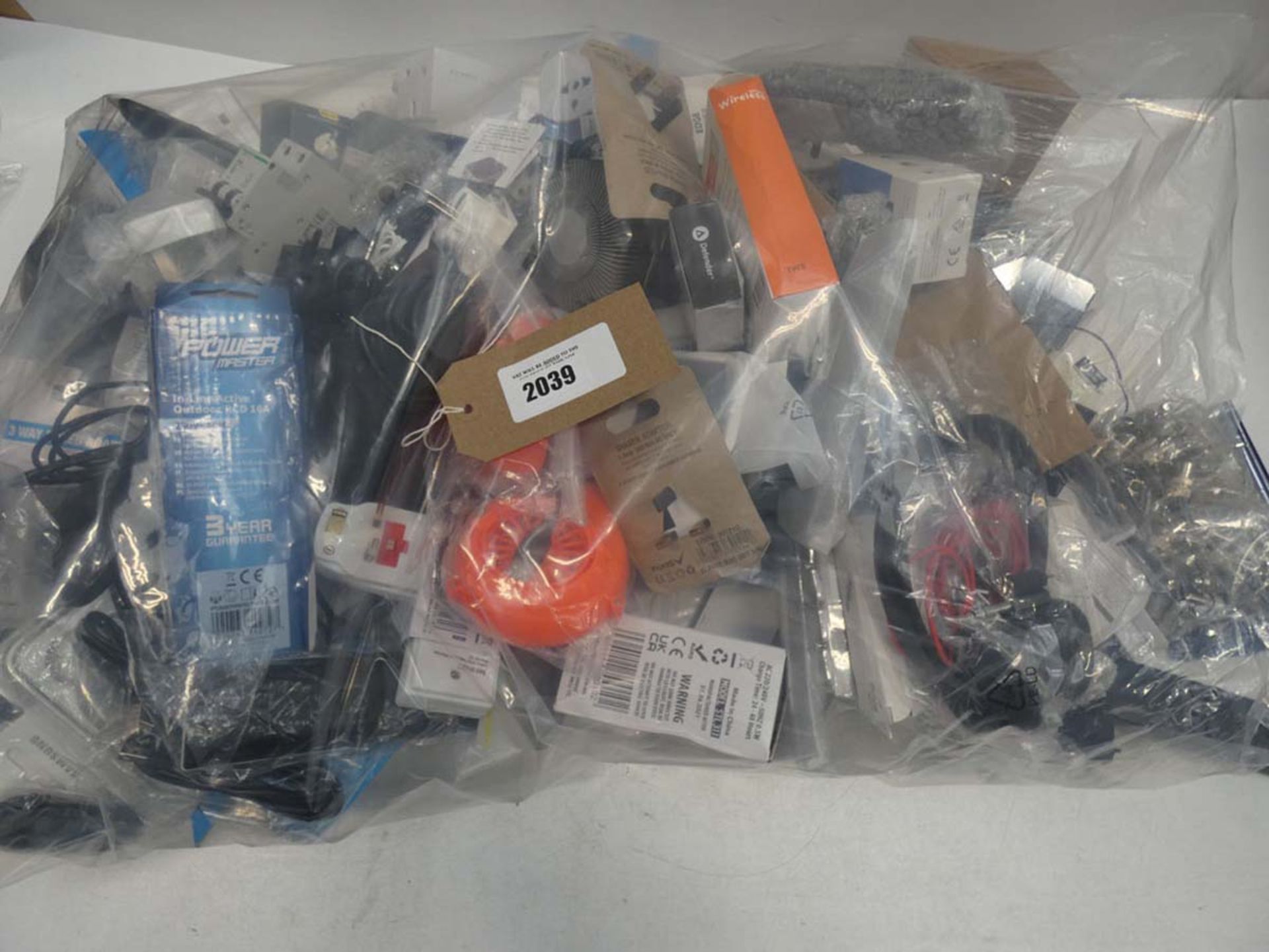 Bag containing quantity of electrical related accessories and devices; adapters, sockets, mp3